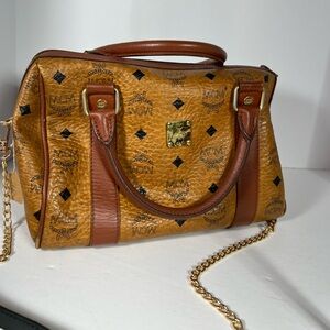 MCM shoulder bag. Coated canvas and leather trim. Chain is unbranded